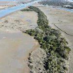 Overhead drone shot of IOP's Local Protected Land's Little Goat Island.