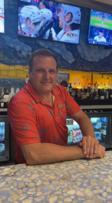 Portrait photo of Laughing Gull's bartender, Patrick Karlovec.