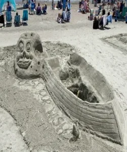 A sand model of a boat dinghy on Isle of Palms, South Carolina.