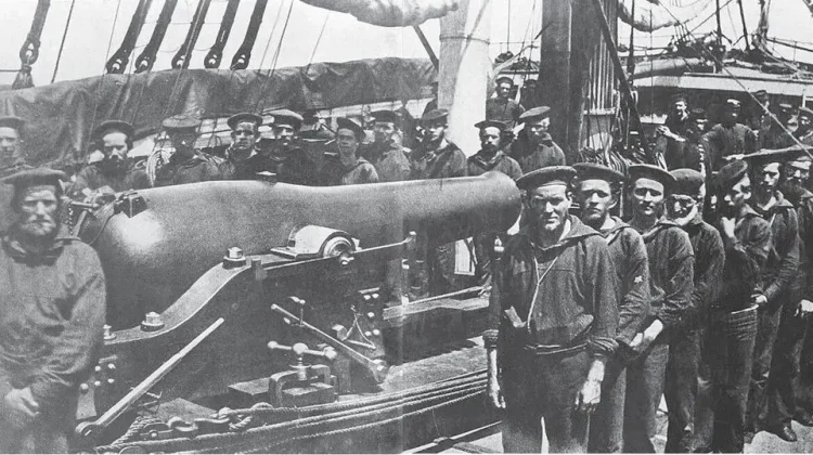 Historical photo featuring the naval crew aboard the USS Wissahickon.