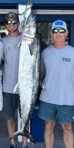 The Hartness guys showing off their prize catch of the day.
