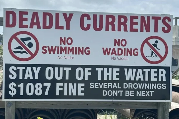 New, bilingual, signage displayed on IOP, SC.