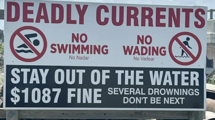 New, bilingual, signage displayed on IOP, SC.