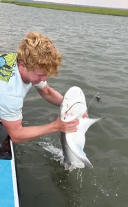 A shark nerd teach Isle of Palms' youth all about how to tag a shark in the Intercoastal Waterway.