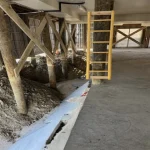 Home on stilts foundation restoration for homeowners insurance on IOPSC