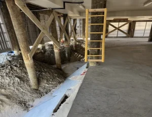 Home on stilts foundation restoration for homeowners insurance on IOPSC
