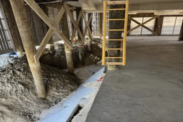 Home on stilts foundation restoration for homeowners insurance on IOPSC