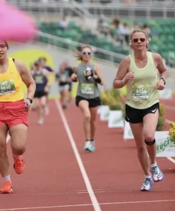 Pic of Isle of Palms, SC bartender and runner, "Marathon Liz" participating in a West Coast marathon.