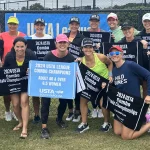 Wild Dune's women's tennis team showing off their South Carolina championship title.