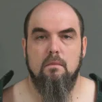 Prision mugshot of man suspected of hitting and causing bodly harm yo children in a hit and run on Sullivan's Island, South Carolina.