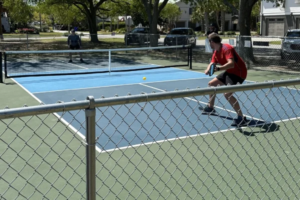 Two men playing a one-on-one game of pickleball on Isle of Palms Recreation Center's new pickleball court.