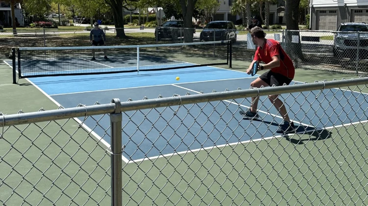 Two men playing a one-on-one game of pickleball on Isle of Palms Recreation Center's new pickleball court.