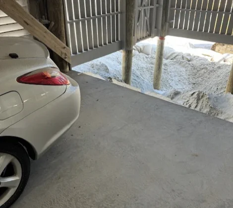 Close-up view of house on Isle of Palms, SC's foundation collapse.