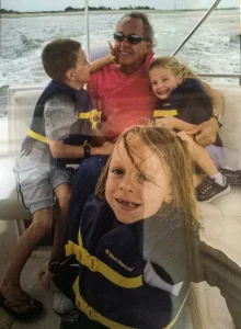 Family photo of the Schifians on their boat, back in the day.