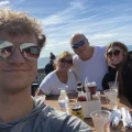 Group photo of the Adams family on the rooftop deck of IOP's Coconut Joes.