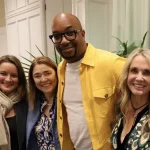 Author Kwame Alexander posing with fans at Wild Dunes' Author Event.