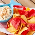 Coconut Joe's cold Crab Dip with house seasoned tortilla chips.