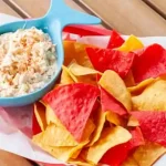 Coconut Joe's cold Crab Dip with house seasoned tortilla chips.