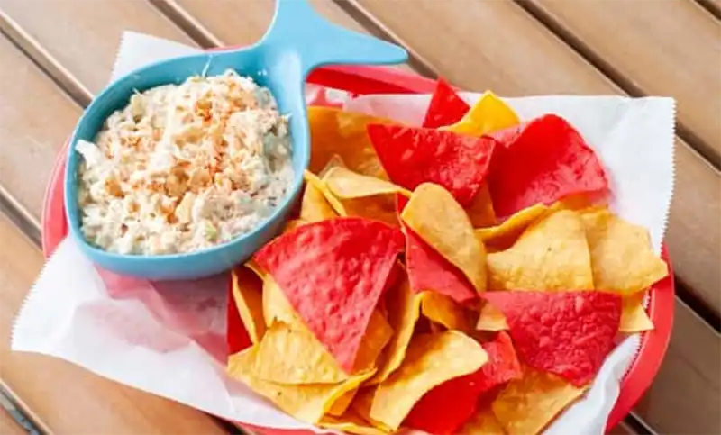 Coconut Joe's cold Crab Dip with house seasoned tortilla chips.