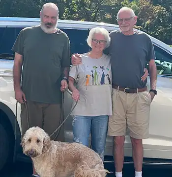 The Cooper family of Spartanburg SC, with Milo their goldendoodle.