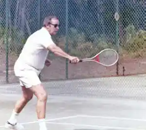 Henry Finch plays a game of tennis at Wild Dunes.