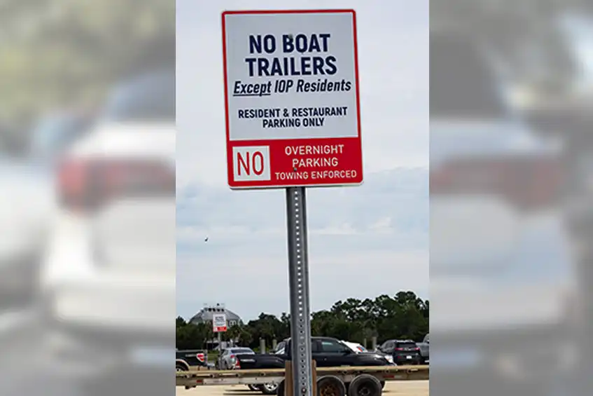 Parking Sign: No Overnight Boat Trailer Parking, EXCEPT IOP RESIDENTS.