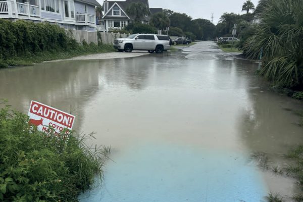 Looking down a flooded residential street on Isle of Palms, South Carolina.