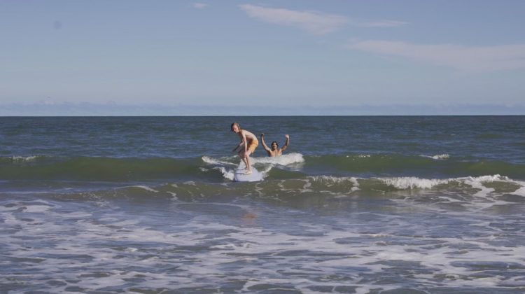 Isle of Palms surfer student catching first wave.