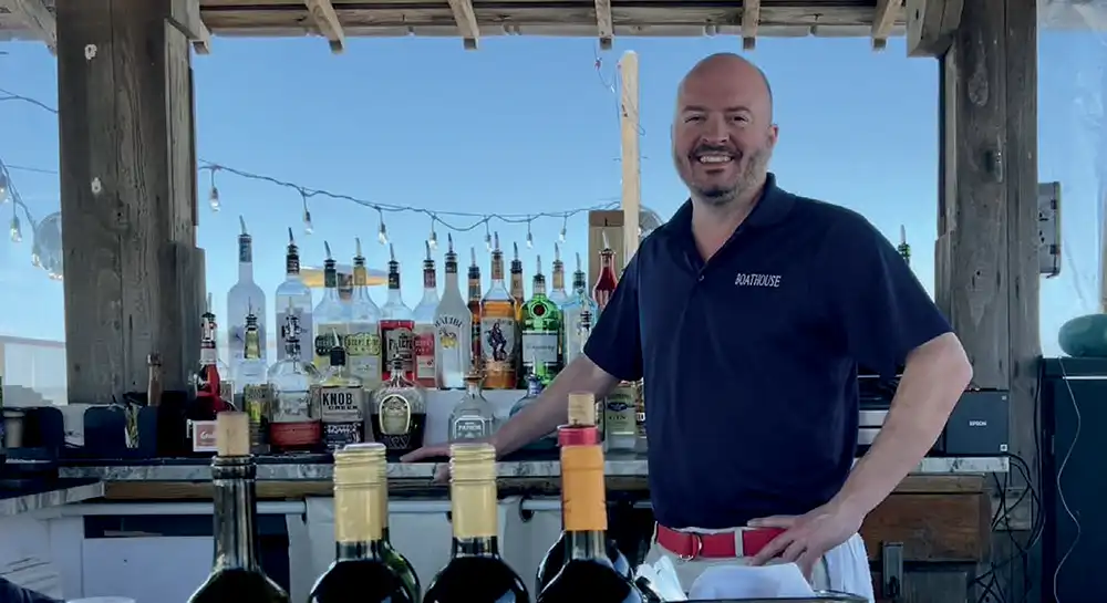 Joshua Blaylock, behind the bar at The Boathouse.