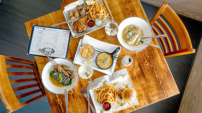 Table with a meal prepped at Islander 71, a new restaurant in Isle of Palms, SC.